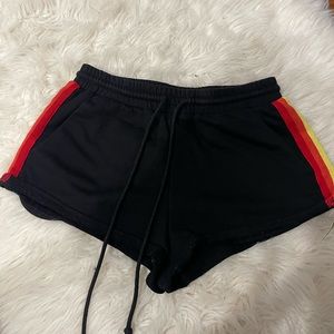 Wild Honey small back shorts lightly worn with colorful stripes on side